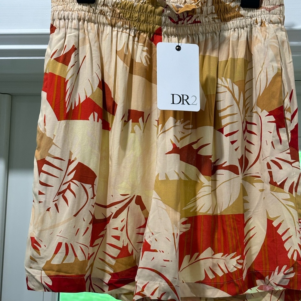 Size small flowy shorts with elastic waist.